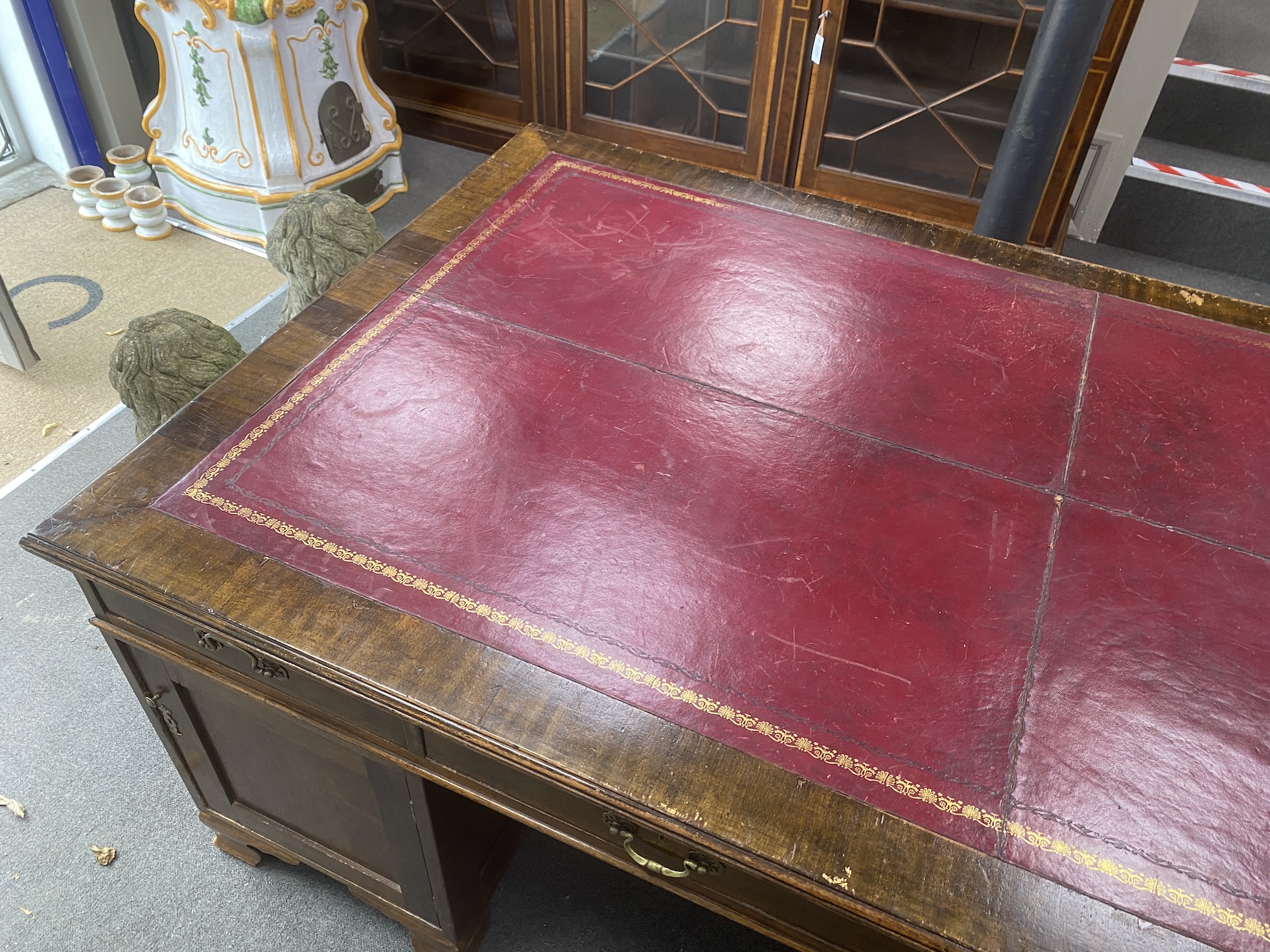 A large 1920's George III mahogany pedestal partner's desk, two drawers Phillip, Bristol, length 214cm, width 120cm, height 78cm